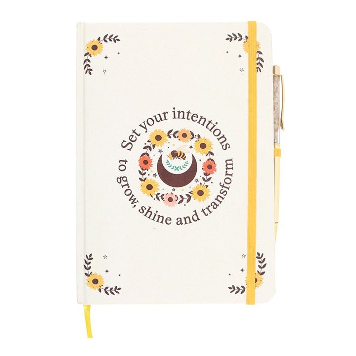 Beautiful Solstice-inspired journal with citrine crystal pen, perfect for writing, goal setting, and self-care