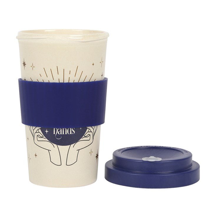 Reusable bamboo coffee cup with eco-friendly materials and mystical design
