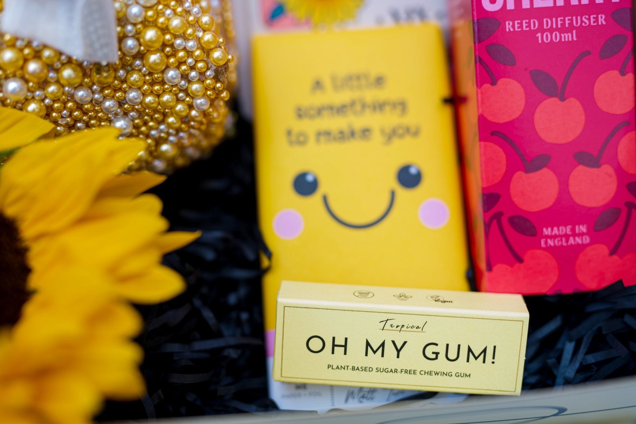 Brighten someone’s day gift set with chocolate and a gum pack.