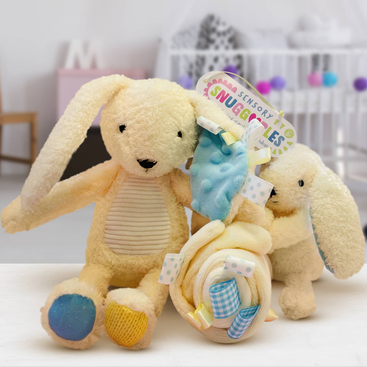 Adorable baby gift set with plush bunny and packaging, ideal for baby showers.