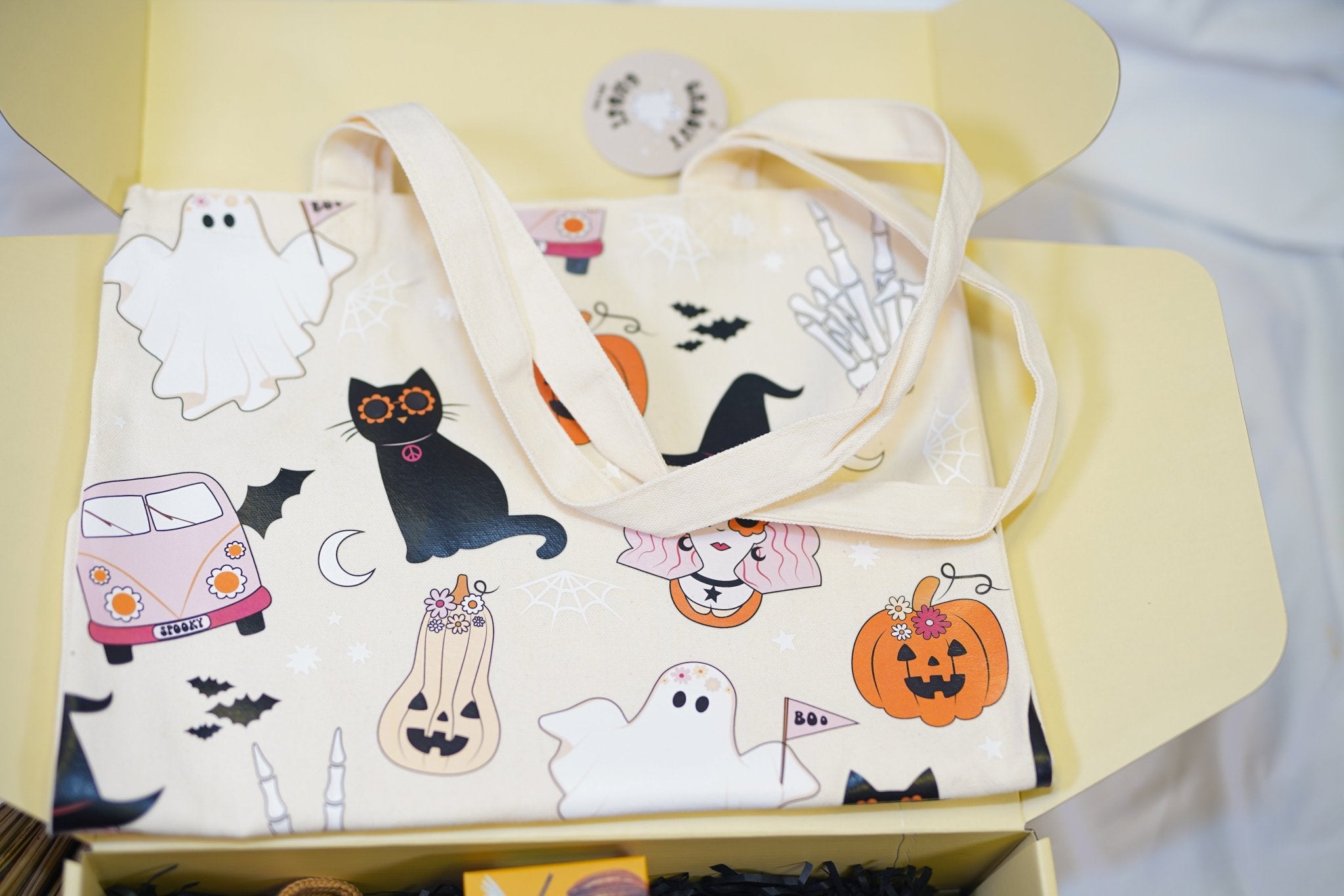 Seasonal spooky inspired gift hamper for her with festive decorations and treats