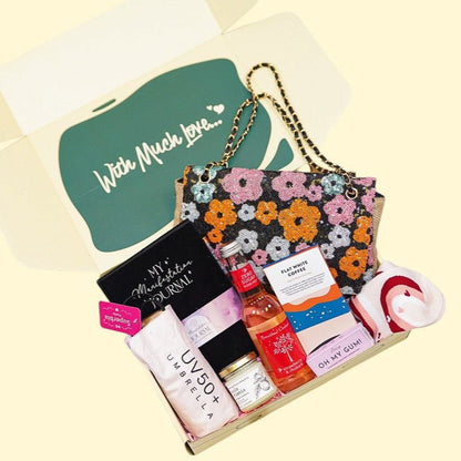 Bad Girl Riri gift box with handbag, candle, chocolate, and cozy socks UK