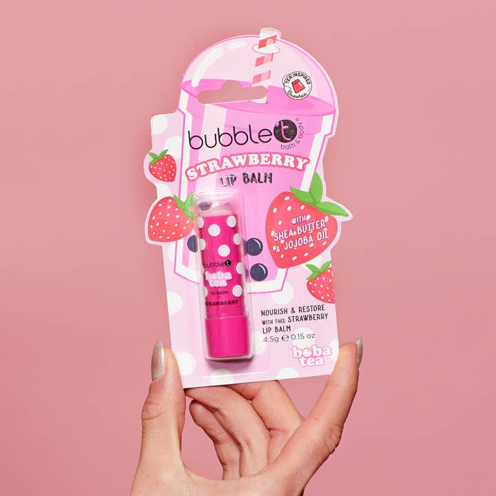 Natural strawberry lip balm providing deep hydration and shine
