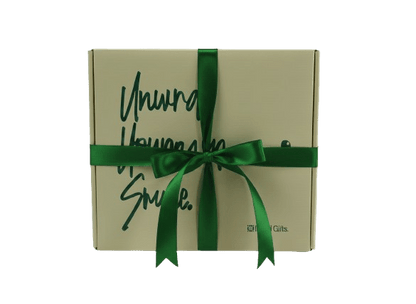 Big gift box with green ribbon finishing