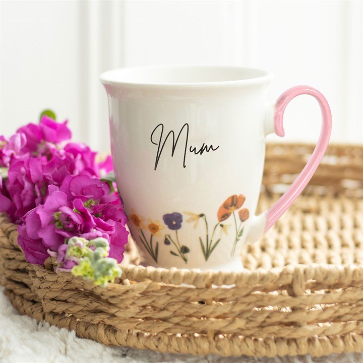 British Wildflower Mum Mug with floral design and pink handle.